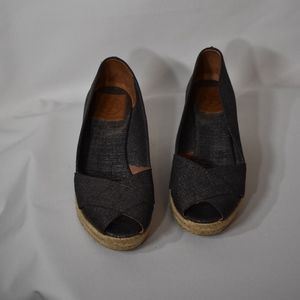 Silver canvas Tory Burch espadrille wedges.